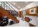 Expansive walk-in closet with built-in storage, tiled floors, and unique murals at 1835 Alicia Way, Clearwater, FL 33764