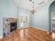 Living room features tile floor, fireplace and french doors at 2409 Heather Manor Ln, Lutz, FL 33549