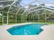 Enclosed pool area, offering a private outdoor experience at 2409 Heather Manor Ln, Lutz, FL 33549