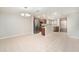 Spacious kitchen with stainless steel appliances and large tile flooring, perfect for cooking and entertaining at 2570 Sea Wind Way, Clearwater, FL 33763