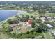 Charming home with a private pool and spacious yard offers serene lake views at 271 Eastpoint Ct, Spring Hill, FL 34606