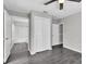 Bedroom showcasing a ceiling fan, with an ensuite bathroom and closet at 271 Eastpoint Ct, Spring Hill, FL 34606