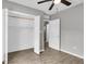 This bedroom features a closet and door to another room at 271 Eastpoint Ct, Spring Hill, FL 34606