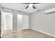 Bedroom with a ceiling fan, and a mini-split system at 271 Eastpoint Ct, Spring Hill, FL 34606