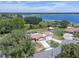 A home features a large lot with private pool and lake views at 271 Eastpoint Ct, Spring Hill, FL 34606