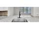 Modern kitchen featuring granite countertops and stainless steel faucet with views of the pool at 271 Eastpoint Ct, Spring Hill, FL 34606