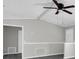 Bright living room boasts neutral paint, tile floors and a modern ceiling fan at 271 Eastpoint Ct, Spring Hill, FL 34606