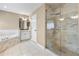 Bathroom featuring a large shower, soaking tub, vanity, and tile flooring at 2910 Red Coat Cir, Brandon, FL 33511