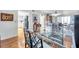 Bright dining room features stylish glass table, wood floors, and modern lighting at 3062 Eastland Blvd # 311, Clearwater, FL 33761