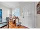 Entryway with hardwood floors and a white front door at 3062 Eastland Blvd # 311, Clearwater, FL 33761