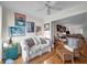 Cozy living room featuring a comfortable couch and an open door leading to the dining room at 3062 Eastland Blvd # 311, Clearwater, FL 33761