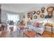 Bright living room with hardwood floors and plenty of natural light at 3062 Eastland Blvd # 311, Clearwater, FL 33761