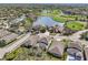 Real estate aerial view of golf course community with scenic views at 4515 Bent Tree Blvd, Sarasota, FL 34241