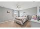 Bright bedroom with ceiling fan, carpeted floors and lovely natural light at 4515 Bent Tree Blvd, Sarasota, FL 34241