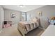 Charming bedroom with carpet floor and decorative bedding at 4515 Bent Tree Blvd, Sarasota, FL 34241