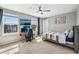 Bedroom with carpet floor, ceiling fan, and modern decor at 4515 Bent Tree Blvd, Sarasota, FL 34241
