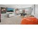 A large game room featuring a pool table, entertainment center, and beanbag chairs at 4515 Bent Tree Blvd, Sarasota, FL 34241