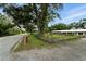 Residential single story home with a fenced yard and a mailbox on the street at 4708 Bugg Rd, Plant City, FL 33567