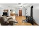 Spacious living room with a wood-burning stove and an open floor plan into the dining area at 4708 Bugg Rd, Plant City, FL 33567