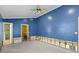 Primary bedroom with hallway and bathroom access at 4717 W Anita Blvd, Tampa, FL 33611