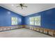 A primary bedroom featuring two large windows for natural light at 4717 W Anita Blvd, Tampa, FL 33611