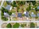 Aerial view of property featuring a lawn and delineated property line in a residential area at 5352 Lowell Ave, Spring Hill, FL 34609