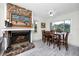 Dining area with stone fireplace and hardwood floors at 6084 71St N Ave, Pinellas Park, FL 33781