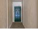 A green front door creating a welcoming entryway at 6236 93Rd N Ter # 3502, Pinellas Park, FL 33782
