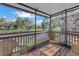 Screened porch with view of the pond and surrounding residential property at 6236 93Rd N Ter # 3502, Pinellas Park, FL 33782