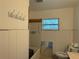 Bathroom with an incomplete bathtub and white paneled walls at 6711 Arroyo Dr, New Port Richey, FL 34652