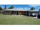 Charming one-story home with well-maintained lawn and a covered parking area at 6711 Arroyo Dr, New Port Richey, FL 34652