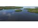 Scenic aerial of mangrove islands in a winding waterway, ideal for boating, fishing, and nature lovers at 6711 Arroyo Dr, New Port Richey, FL 34652
