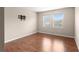 Bedroom featuring hardwood floors and a TV mount at 7333 S Trask St, Tampa, FL 33616