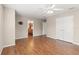 Spacious bedroom with wood floors, a closet, and an en-suite bathroom at 7333 S Trask St, Tampa, FL 33616