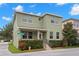 Well-maintained home featuring a two-story facade and lush greenery, situated on a corner lot at 7333 S Trask St, Tampa, FL 33616