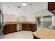 Bright kitchen with stainless appliances, granite counters, and adjacent patio access at 7333 S Trask St, Tampa, FL 33616