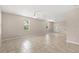 Spacious living room featuring tiled floors, providing an expansive and airy atmosphere at 7333 S Trask St, Tampa, FL 33616
