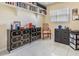 Bedroom or office space with tiled floors, storage, and shelving at 751 Bayshore Dr, Tarpon Springs, FL 34689