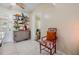 Cozy kitchen with decorative shelf, cabinet, and decorative chair at 751 Bayshore Dr, Tarpon Springs, FL 34689