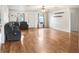 Spacious living room boasts sleek hardwood floors and recessed lighting at 7841 Royal Stewart Dr, New Port Richey, FL 34653