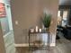 Stylish entryway featuring a glass console table with decorative accents and elegant decor, creating a welcoming ambiance at 9481 Highland Oak Dr # 1506, Tampa, FL 33647