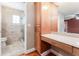 Bathroom featuring a walk-in shower and vanity area at 104 Foxwood Dr, Brandon, FL 33510