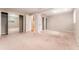 Spacious bedroom with carpet floors, large mirrored closet, and lots of natural light at 104 Foxwood Dr, Brandon, FL 33510
