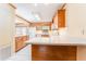 Spacious kitchen featuring wood cabinets and countertops at 104 Foxwood Dr, Brandon, FL 33510