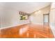 Bright living room featuring hardwood floors, a large window, and neutral wall colors at 104 Foxwood Dr, Brandon, FL 33510