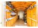Organized shed interior providing ample storage space with shelving and hooks for tools and equipment at 104 Foxwood Dr, Brandon, FL 33510
