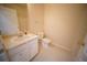 Neat bathroom featuring a clean vanity, toilet, and shower combo, providing essential amenities at 10409 Villa View Cir # 10409, Tampa, FL 33647