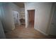 Hallway with desk and storage space, leading to the laundry room and other areas at 10409 Villa View Cir # 10409, Tampa, FL 33647