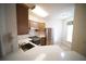 Well-equipped kitchen with stainless steel appliances and a pass-through window at 10409 Villa View Cir # 10409, Tampa, FL 33647