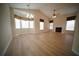 Bright living room featuring bay windows, a chandelier, a ceiling fan, and a fireplace at 10409 Villa View Cir # 10409, Tampa, FL 33647